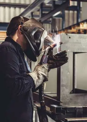 Welder at work in the Hollywood Metalfab workshop